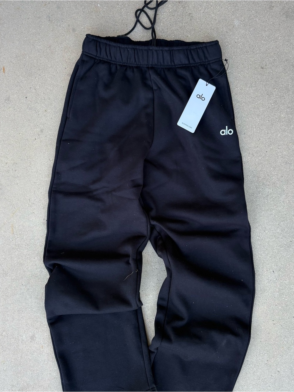 ALO Yoga mens Black Jogger Sweatpants with White Logo